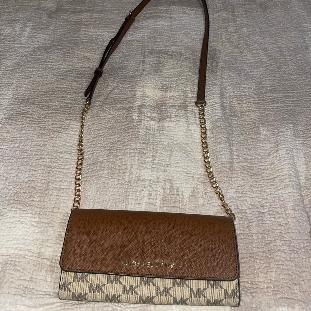 NWT. Michael Kors, tan and brown cross body wallet on chain.